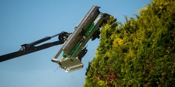 Tractor mounted hedge cutter