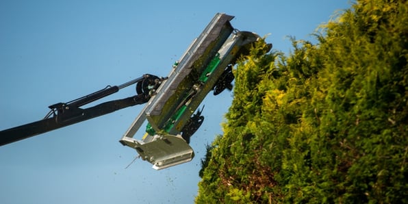 Tractor mounted hedge cutter