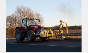 Barrier Mower mowing under barriers